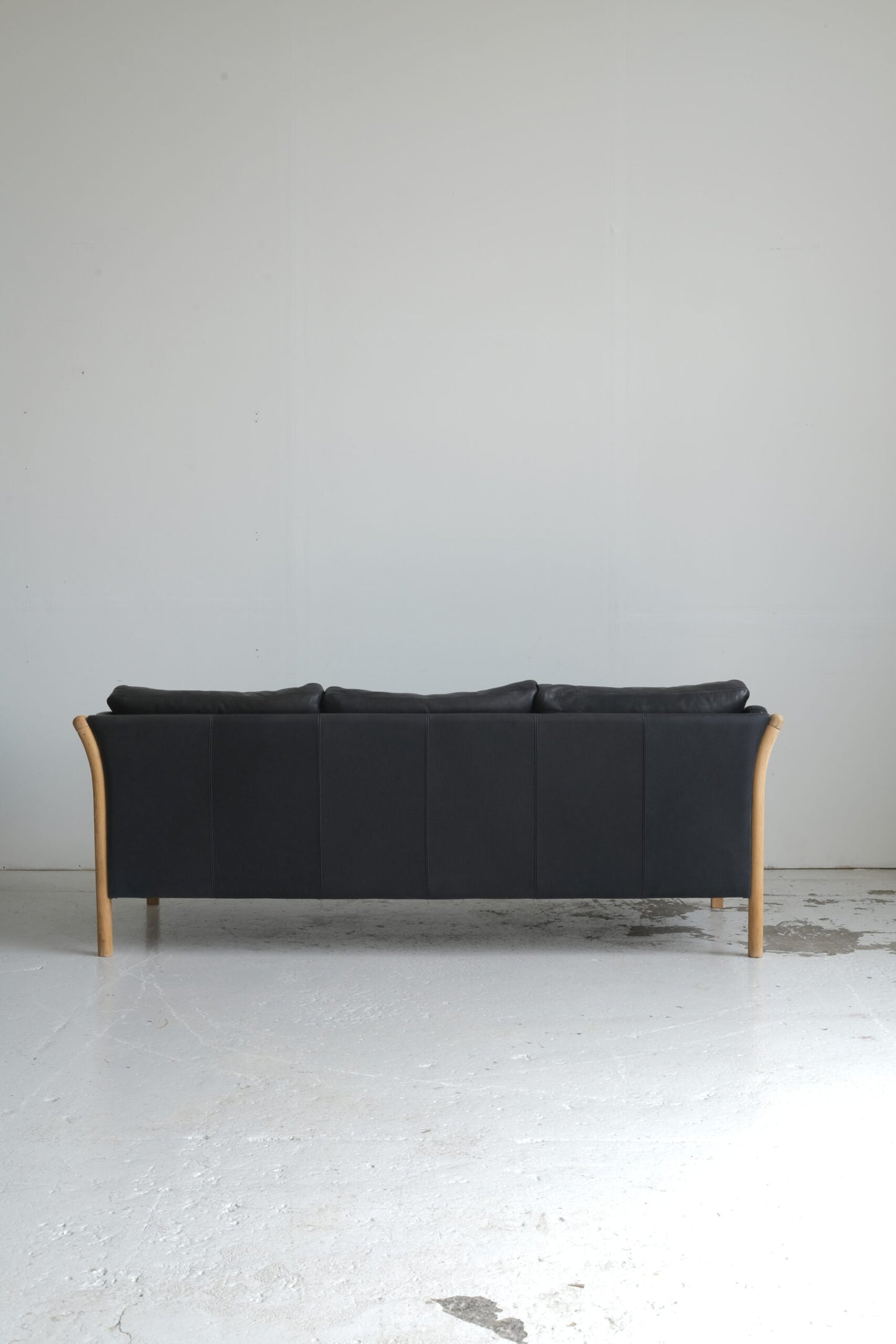 Three-seater sofa, black leather