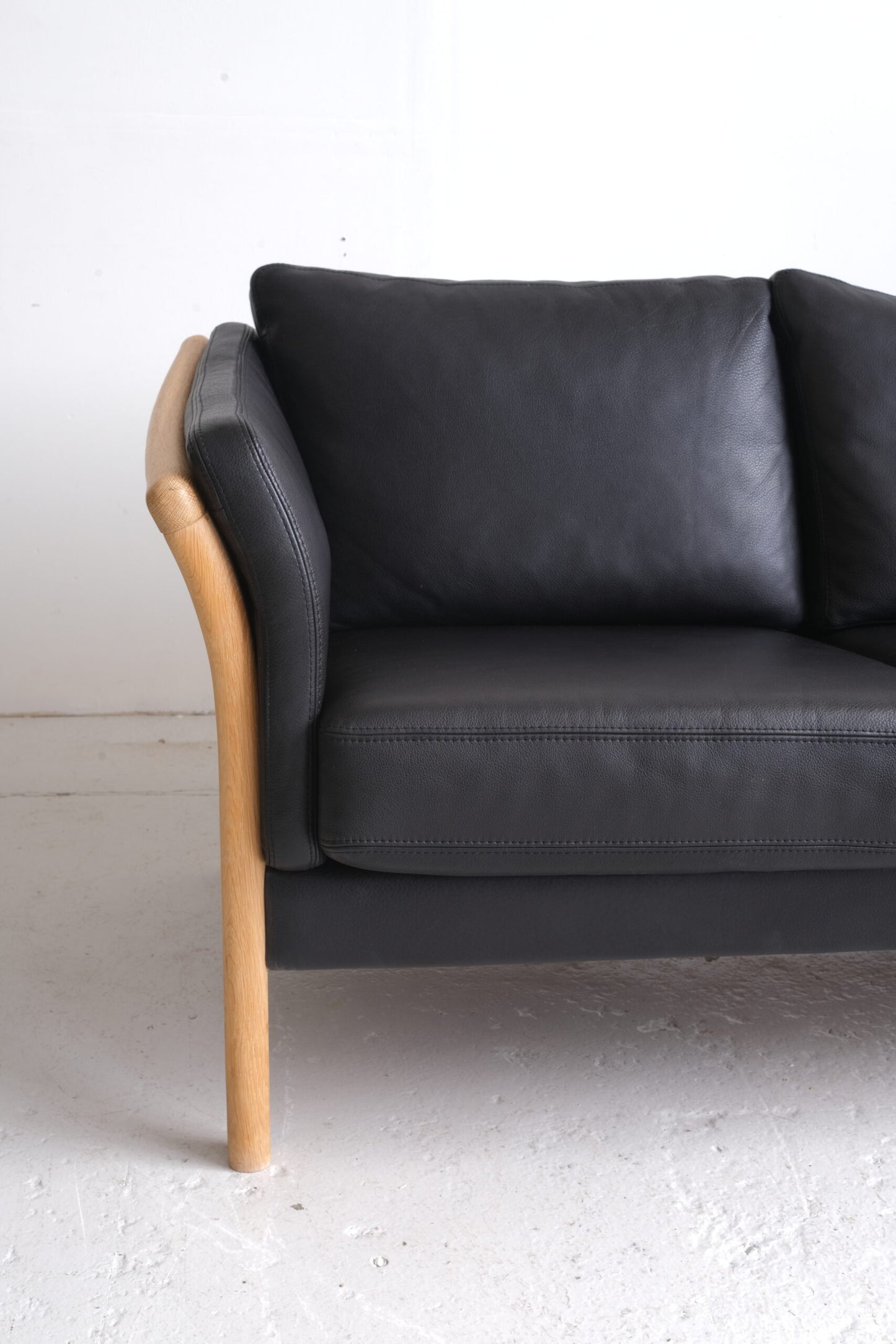 Three-seater sofa, black leather