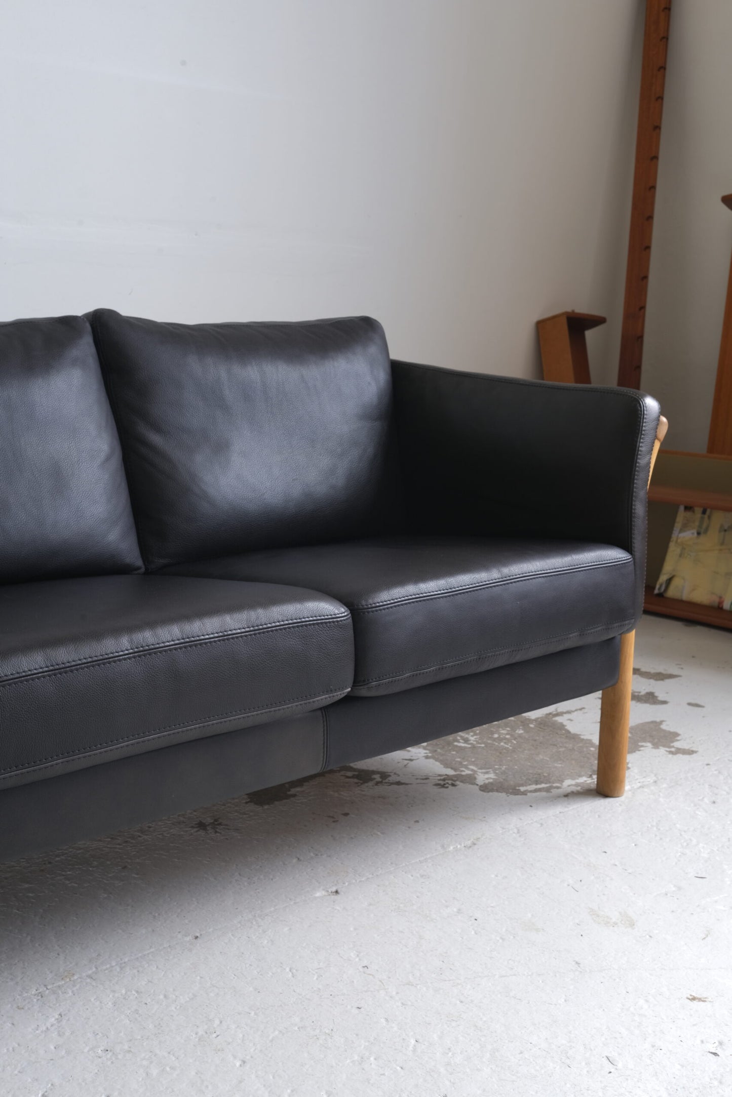 Three-seater sofa, black leather