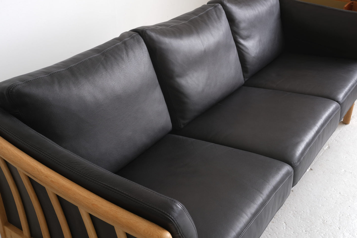 Three-seater sofa, black leather