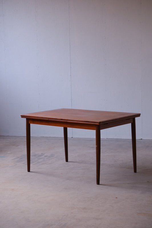 Danish teak table with dutch extensions